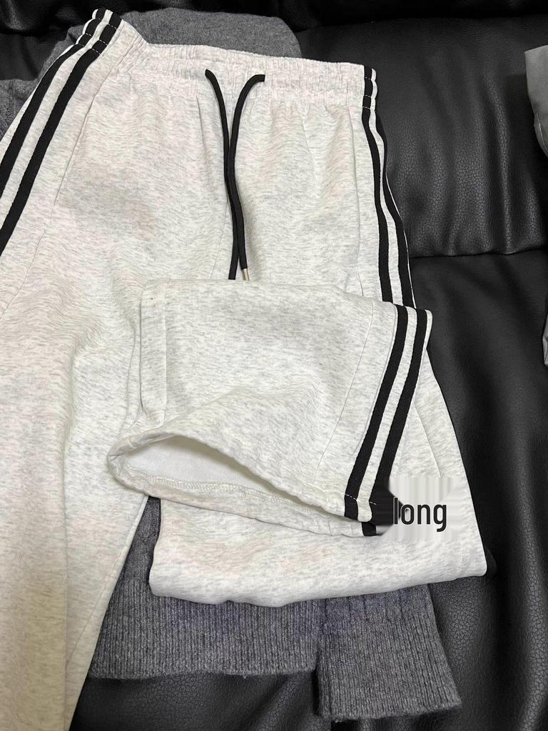 Damskie dresowe spodnie w paski, drapowane, z prostą nogawką, Wiosna/Jesień 2025: Wszechstronne szerokie nogawki, mankiety, swobodny krój.