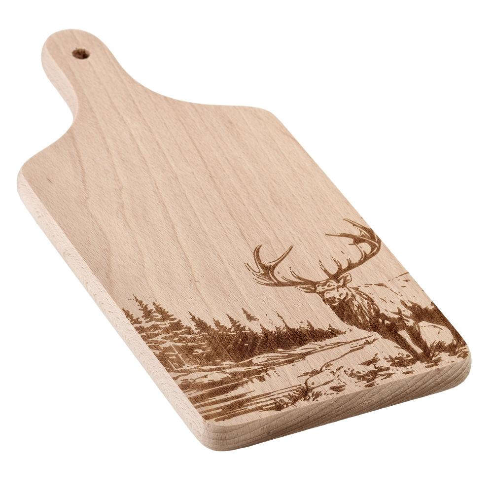 A Wooden Cutting Board with an Engraved Deer Against a Forest Backdrop.