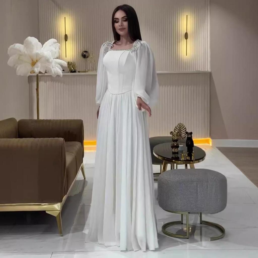 Elegantní patchworkové šaty s vysokým pasem - Kolekce léto 2024