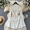 Hollow knitted crew neck dress women's spring and summer wear long sleeves waist A-shaped skirt commuting thin gentle wind