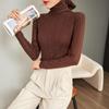 Maglione a collo alto slim in maglia pesante di seta di gelso e lana con motivo a rombi a righe stampato - Collezione Autunno/Inverno 2024.