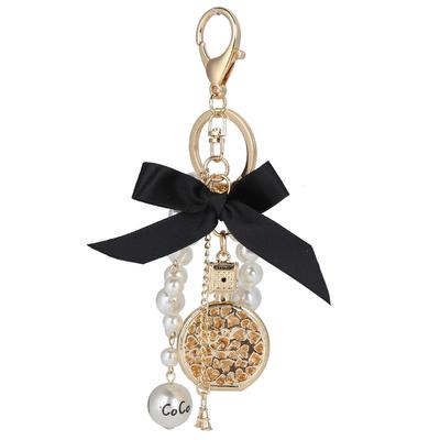 Porte-clés Alliage Nœud Papillon Forme Bouteille de Parfum Pendentif Fait Main Perle Décoration Porte-clés