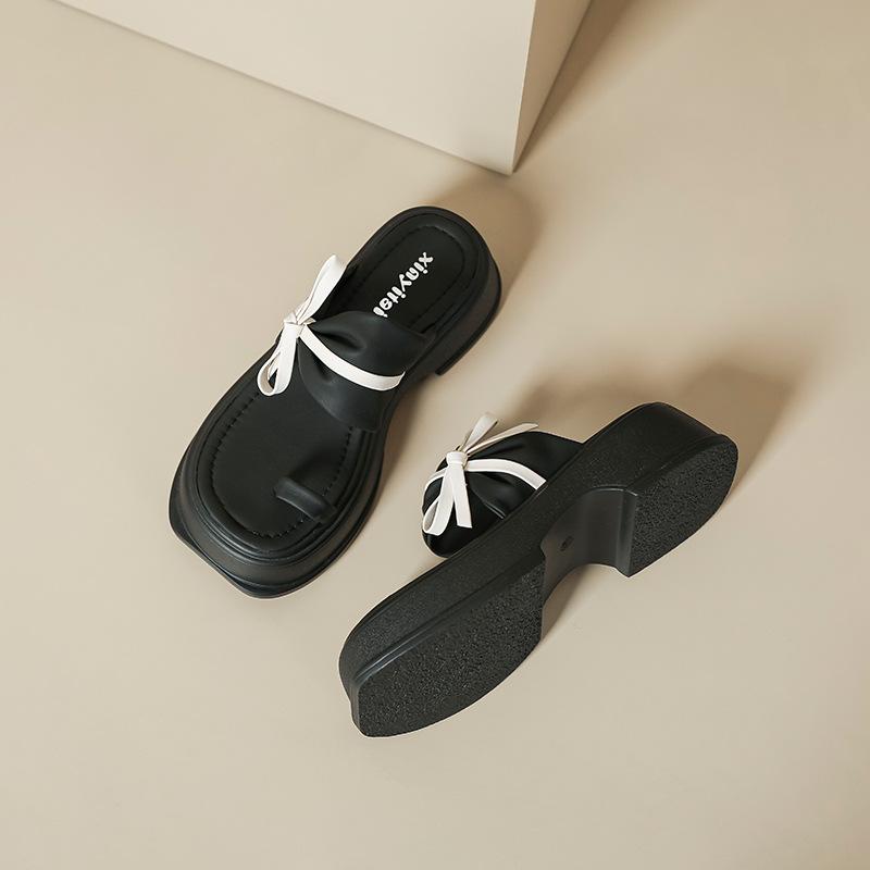 Retro thick-bottomed cool slippers wear summer new fashion bow one-word drag fairy wind cover toe Roman slippers girl