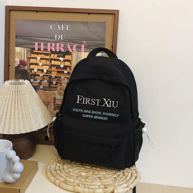 School bag Korean version ins style versatile junior high school student school bag solid color letter backpack high value simple lightweight backpack