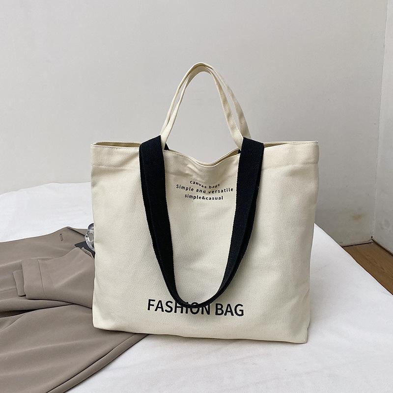 New Canvas Women's Bag Korean Street Trend Handbag Bag with Simple and Versatile Letters and Large Capacity Shoulder Oblique Span Bag