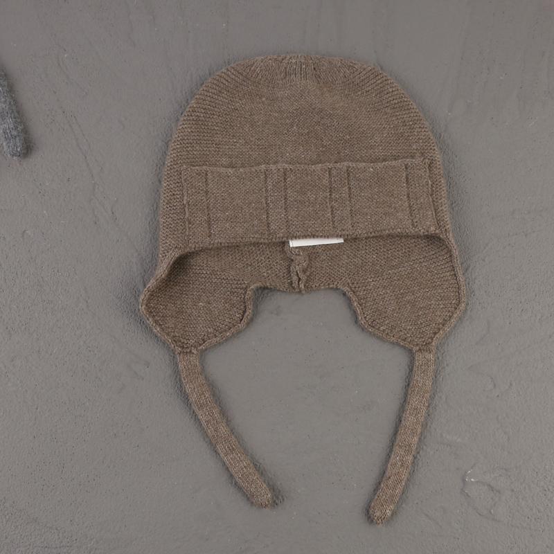 

Нова зимова кашемірова шапка-бомбер з кроликового хутра 2022 р. Жіноча в’язана м’яка суцільна шапочка для захисту вух Тепла вовняна лижна шапка