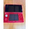 Вживана червона консоль Nintendo 3DS із зарядним пристроєм та док-станцією