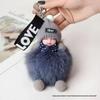 Cross Real Fox Fur Plush Doll Keychain - Cute Sleeping Pendant for Cars, Luggage, and Bags.