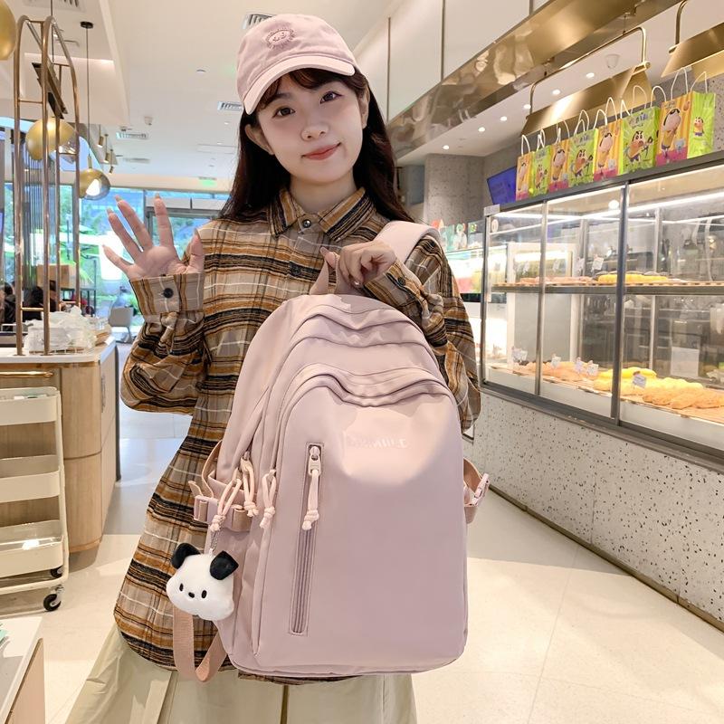 Student Schoolbag New Simple Backpack Large Capacity Junior High School Student Leisure Bag Going Out Light Backpack