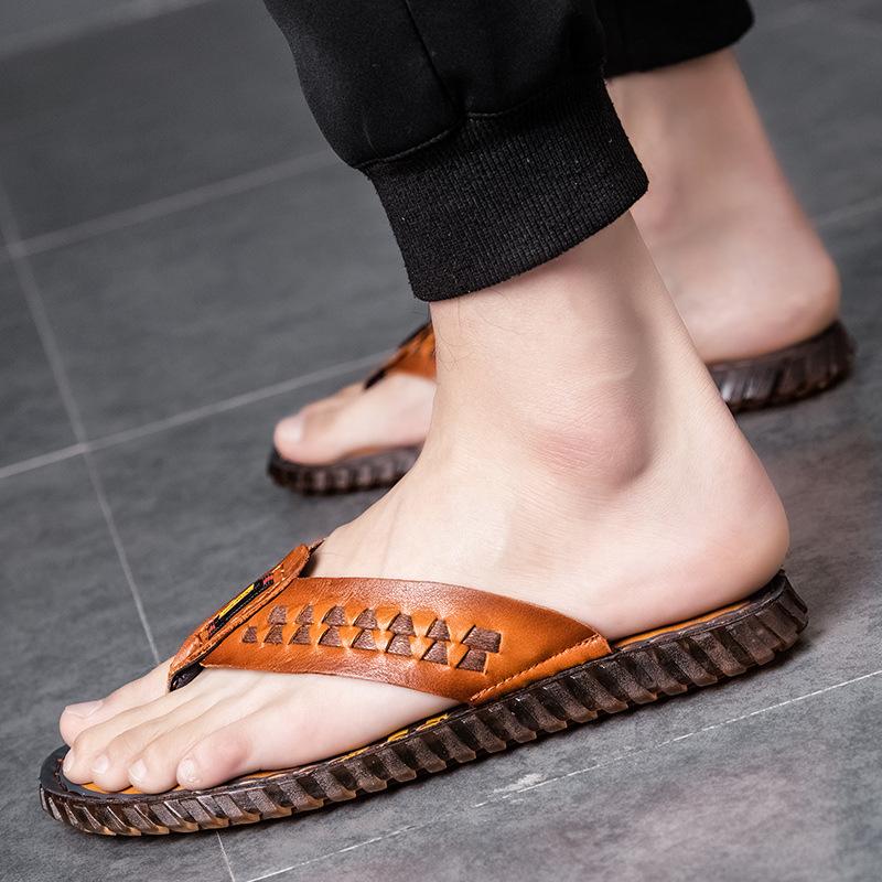 2025 high-end comfortable men's summer wear a pedal on the first layer of cowhide men's flip-flops European station slippers men's trend