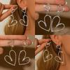 Boucles d'oreilles strassées en forme de cœur ajouré exagéré, adaptées aux filles pour un port quotidien, pour offrir en cadeau lors des fêtes et des anniversaires.