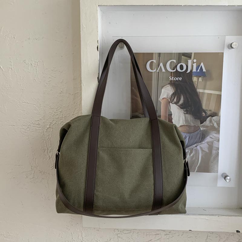 Lazy portable large-capacity canvas bag 2025 new tote bag niche casual retro commuter shoulder big bag women