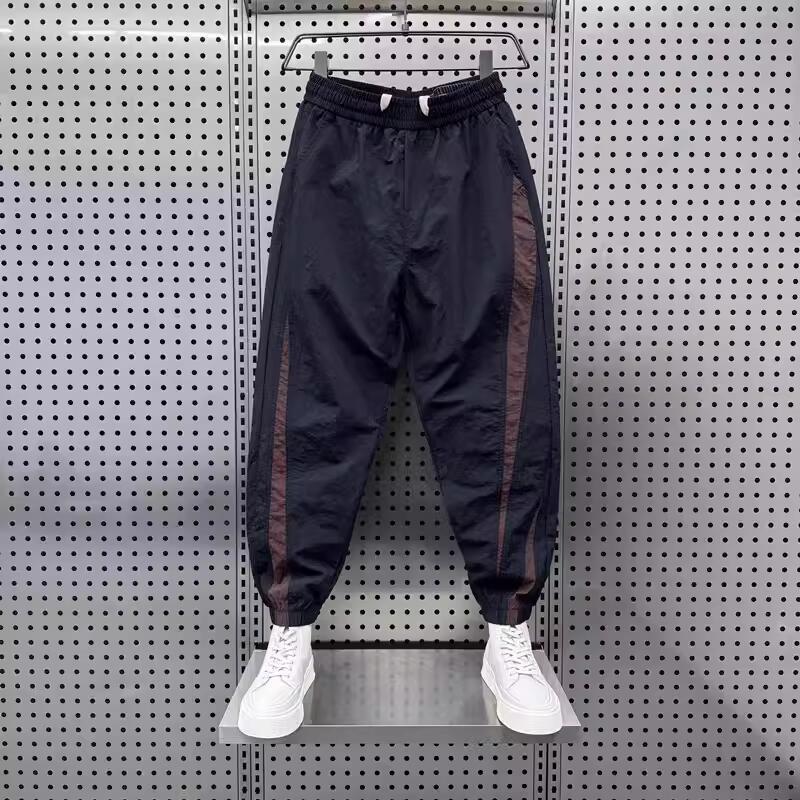 Men's Stylish Ice Silk Quick-Dry Harem Pants - Spliced, Fashionable, Versatile, and Trendy for Spring and Summer.