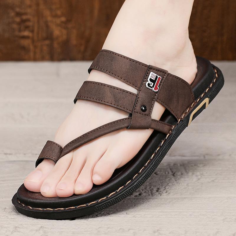 Slippers men's 2025 summer new men's Korean version of personality niche fashion non-slip outer wear driving leather cover toe drag