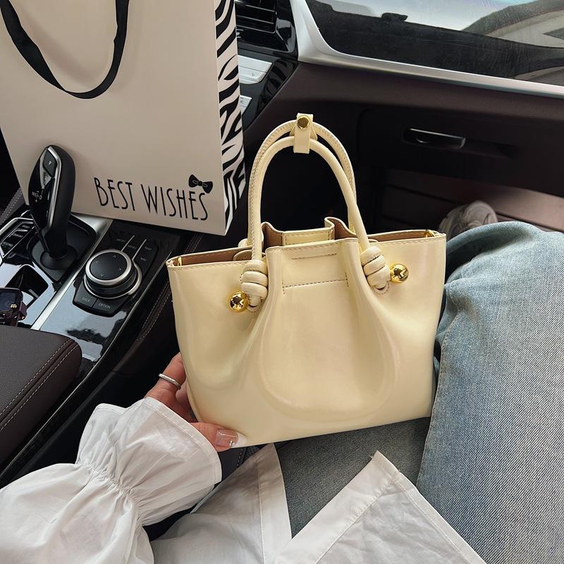Summer New Fashion Light Luxury Simple Versatile Bag Lesbian Commuter Handbag Hand Bag Cloud Bag Woman