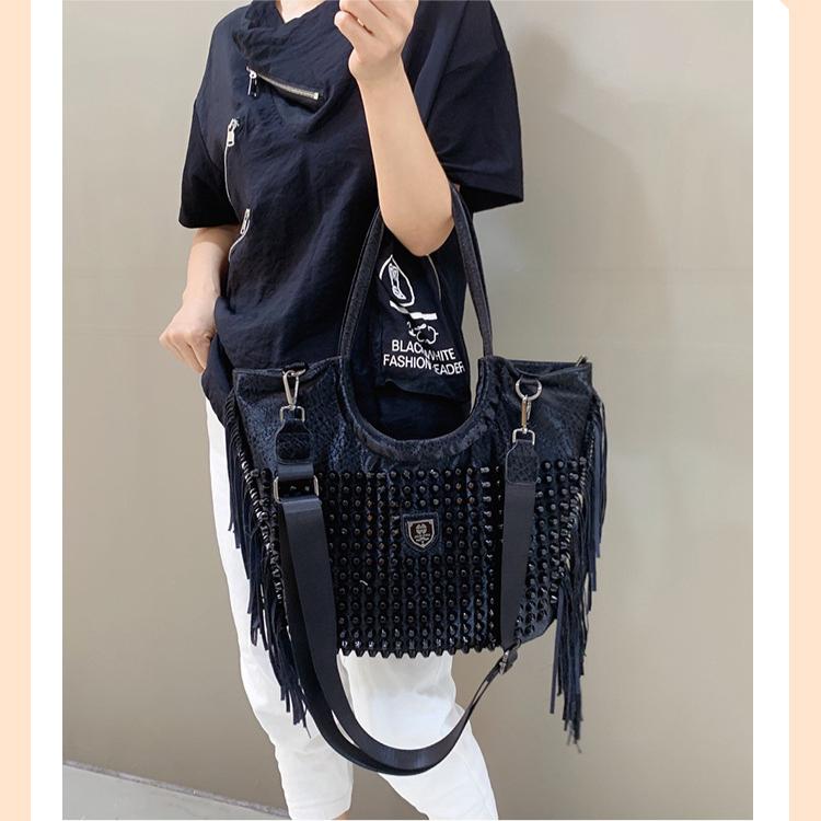 2024 New Shoulder Women's Bag Fashion Casual Rivet Versatile Soft Leather Single Shoulder Large Capacity Bag with Tassel
