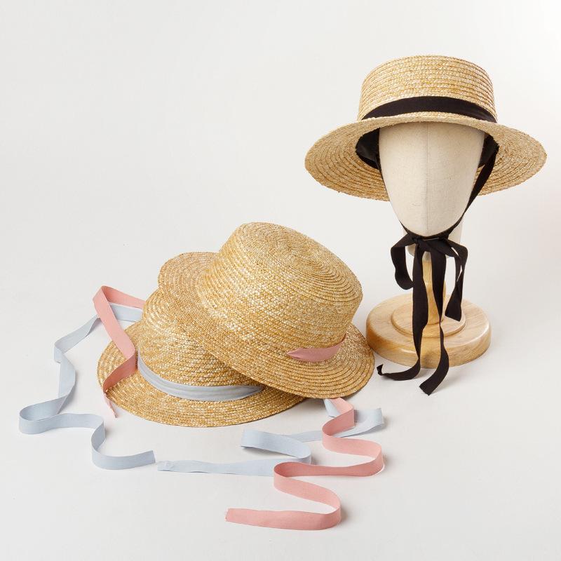 Children's spring and summer new straw flat-top straw hat with straps, outdoor beach travel, sunshade and sun protection, wide-brimmed straw hat