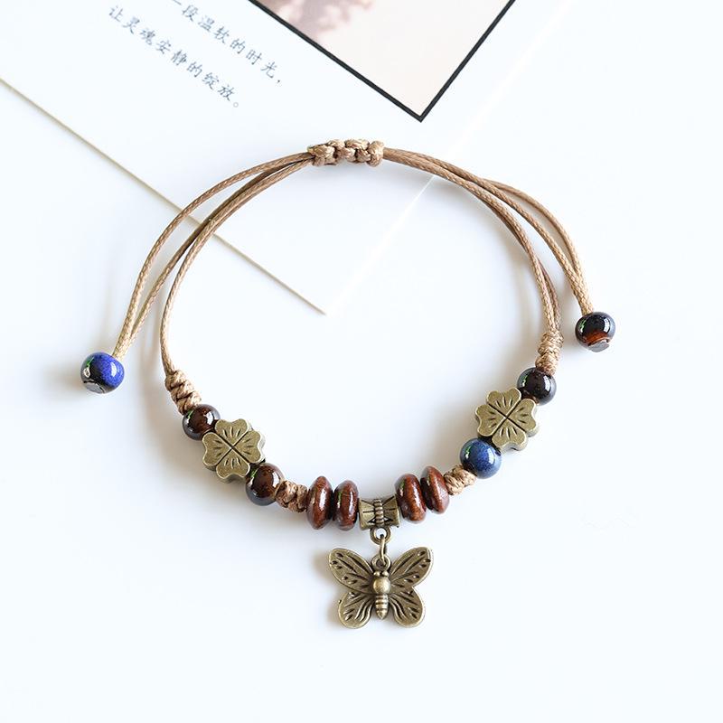 

Браслет-метелик з порцелянових намистин Dezhen: Керамічний плетений аксесуар у старовинному стилі з бісеру Flower glaze сапфірове скло синього кольору кольору