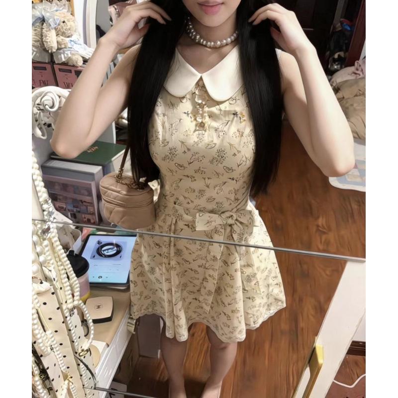 Spring and summer popular new doll collar sleeveless lace-up skirt super beautiful French floral dress waist and thin women's clothing