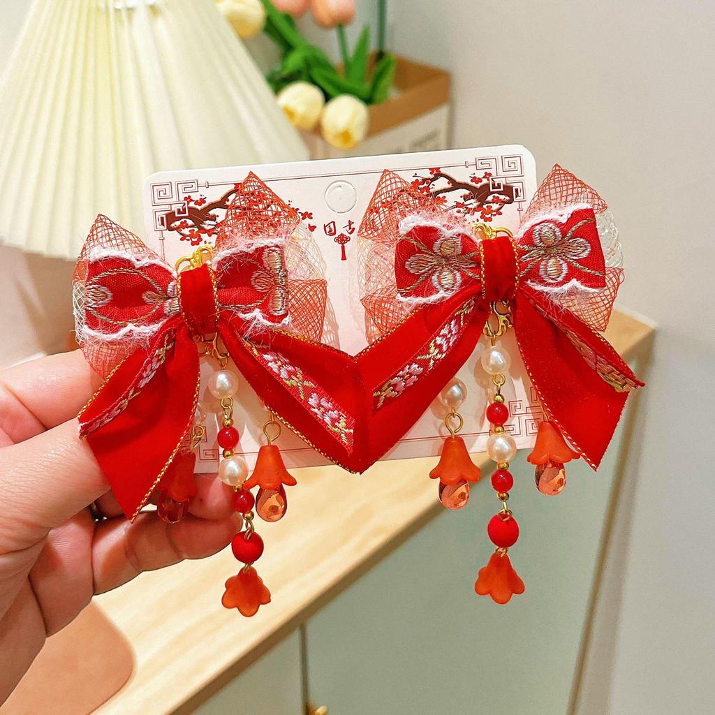 Children's Festive Hanfu Hair Clips: New Year Tassel Bow Headdress for Girls