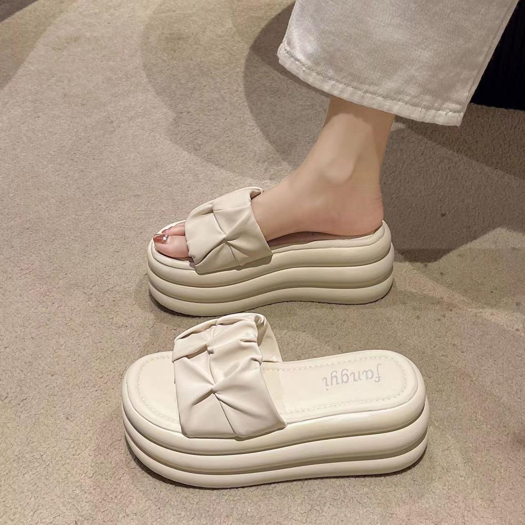 One-word drag women's high-end sense of explosion outside 2024 summer new stepping on shit muffin fashion heightening thick-soled slippers