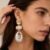 Geometric Hollow Oval Earrings: Smudged, Spliced Stud Design for Women