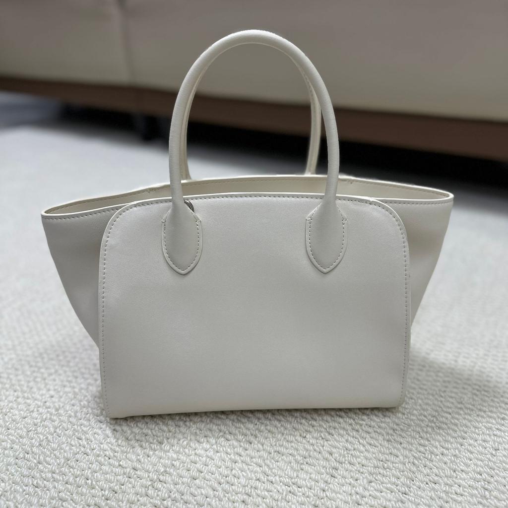 Cross-border explosive tote bag, high-end cowhide handbag, large-capacity messenger, simple commuter women's bag, minimalist style