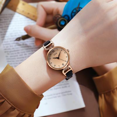 Neue Uhr Damen Design Student Retro Kleine Runde Uhr Damen Gürtel Nische Einfache Temperament Uhr