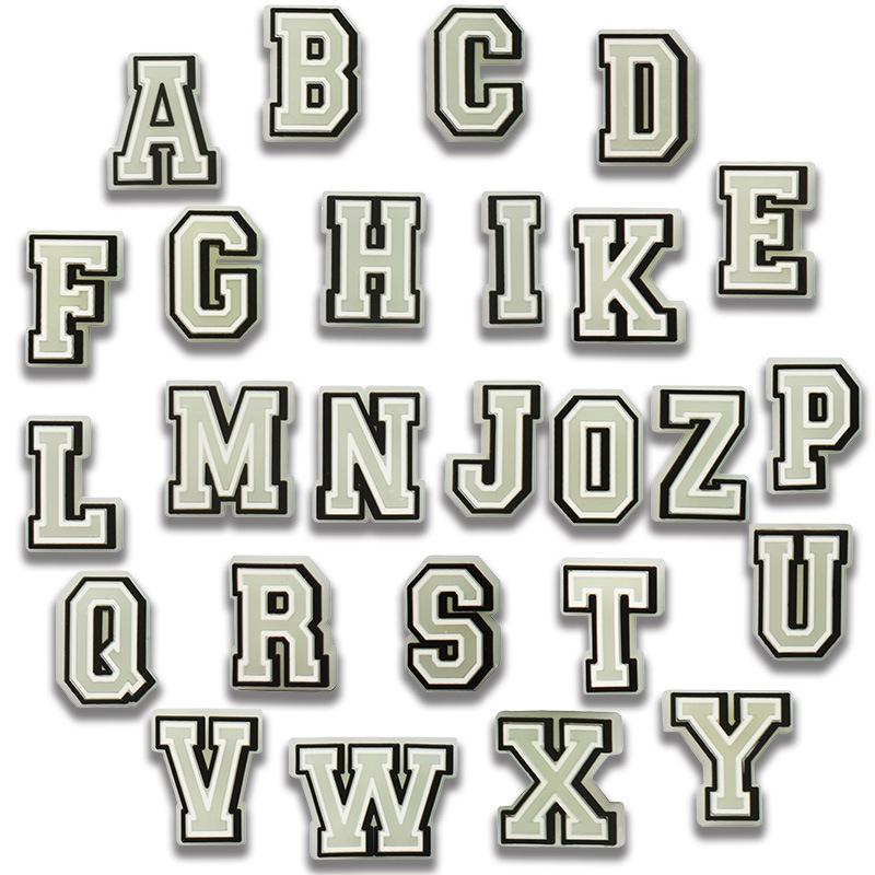 

Luminous Cross-Letter Shoe Charm: Eco-Friendly PVC Decorative Buckle for Crocs. 3x3x0.3