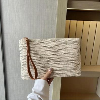 Borsa a clip da donna in paglia intrecciata all'erba di grano Pochette in tessuto fatto a mano