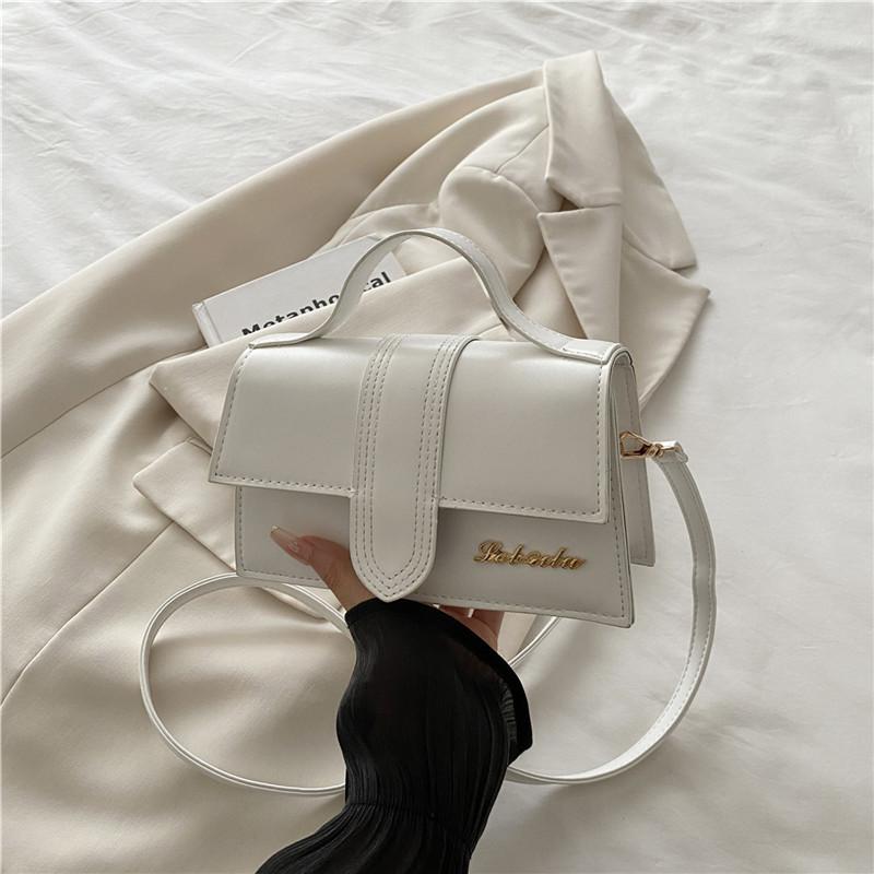 

Fashion niche design bag 2025 messenger bag new small square bag high-end versatile texture portable shoulder bag білий