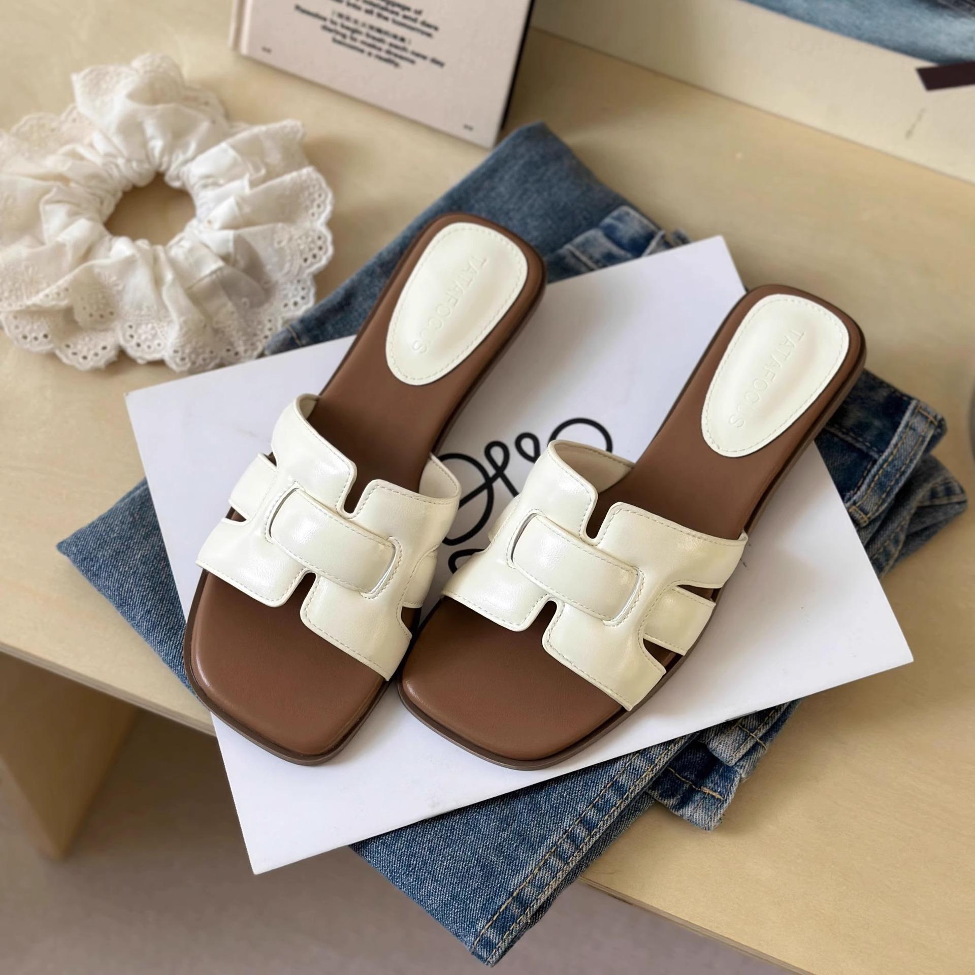 

Hong Kong 2025 summer new white thick-bottomed woven one-word slippers women wear flat-bottomed soft-bottomed cool slippers genuine leather 35