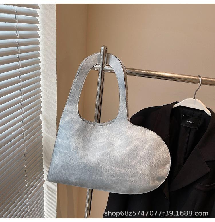 

2025 new underarm bag, high-end big bag, personalized creative love, hand bag, portable shoulder bag світло-синій колір