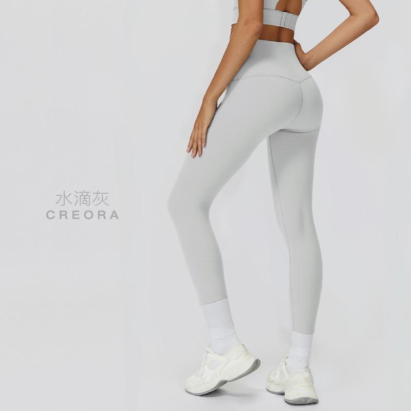 High waist naked nine-point yoga pants, pockets, belly and hips, Pilates fitness pants, and tight sports trousers outside.
