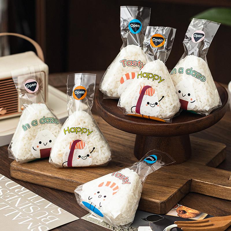 50/100 ks Krásný kreslený trojúhelníkový sáček na balení rýžových koulí mořské řasy Onigiri Sushi Forma na výrobu benta Příslušenství k bento Sáčky na sushi