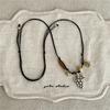 Stylish Alloy Accent Necklace With Sliding Closure Braided Cord and Natural Wood Materials