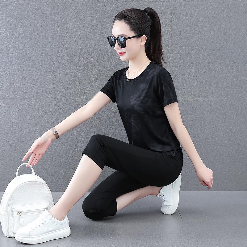 

Женский летний быстросохнущий спортивный костюм Ice Silk 2025 года: Модный комплект из двух частей для бега XL (110-125 kg)