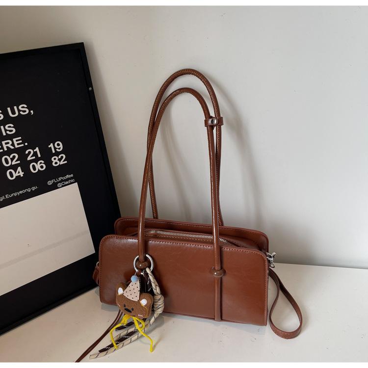 

Модная ретро сумка-тоут из масляной кожи большой вместимости для通勤, женская новая портативная сумка на плечо 2025 года, премиальная сумка подмышку