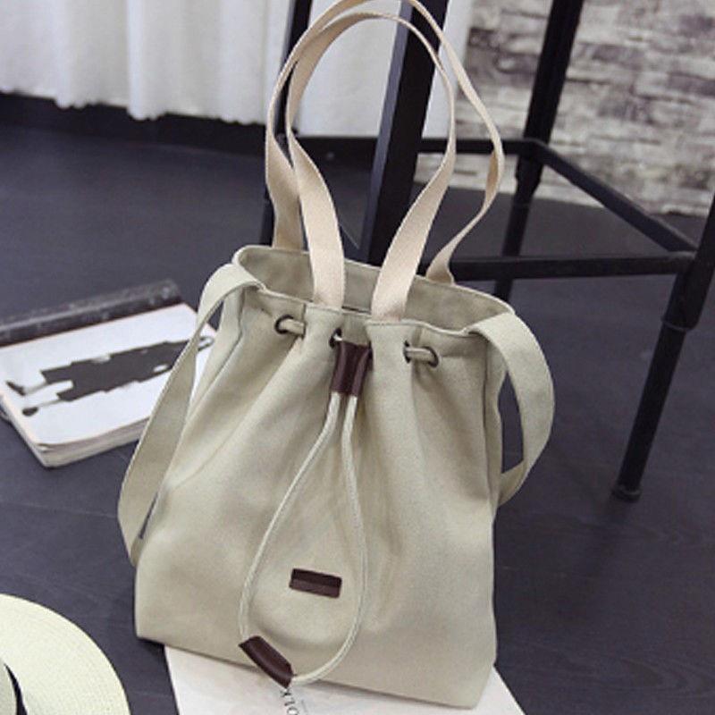 Elegant Women's Canvas Black Handbag With Adjustable Shoulder Strap And Soft Handle