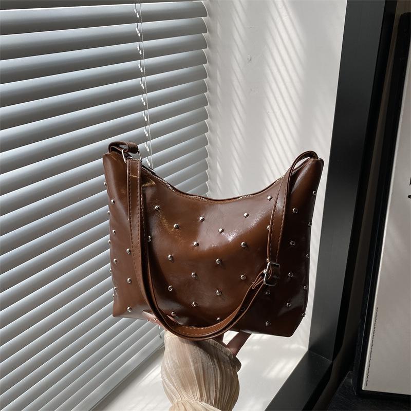 Stylish and simple rivet underarm bag women's new versatile dumpling bag high-end retro messenger bag