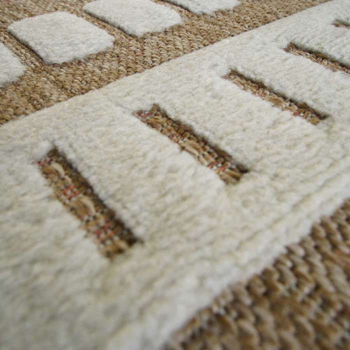 Tapis aspect jute à motif géométrique en relief blanc 160x230
