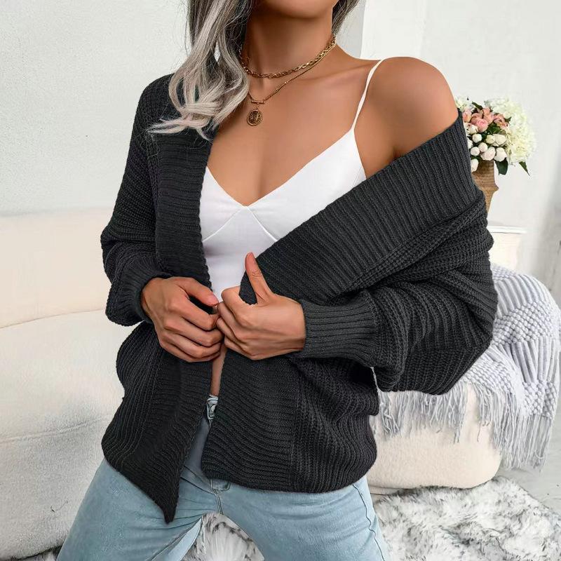 

Europe, America, autumn and winter new long-sleeved loose-knit cardigan solid color buttonless sweater jacket top women 411-81 (average size) чорний