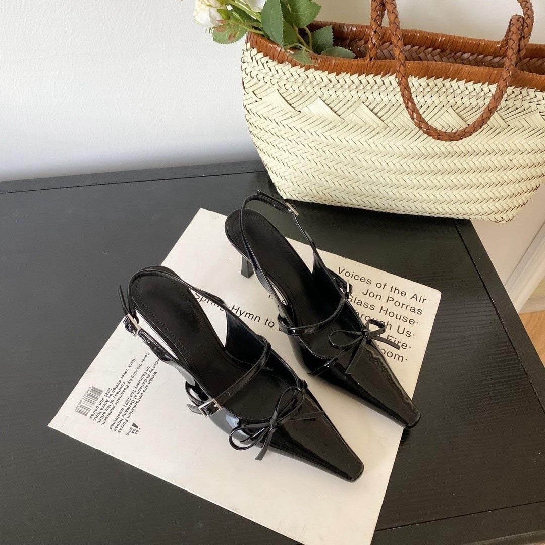 

2025 весна французские сандалии с заостренным носком бант сумка на голову женские тонкие каблуки неглубокий носок высокие каблуки одно слово с темпераментом одиночные туфли 40 чёрный