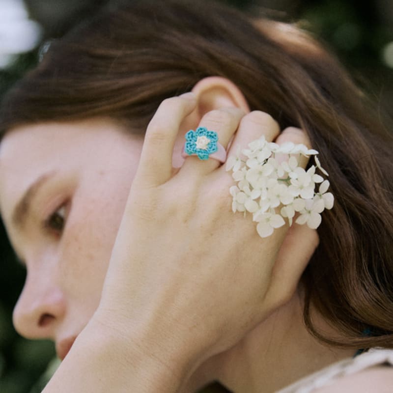 MERRYMOTIVE Gehäkelter handgestrickter Blumenring (4 Farben)