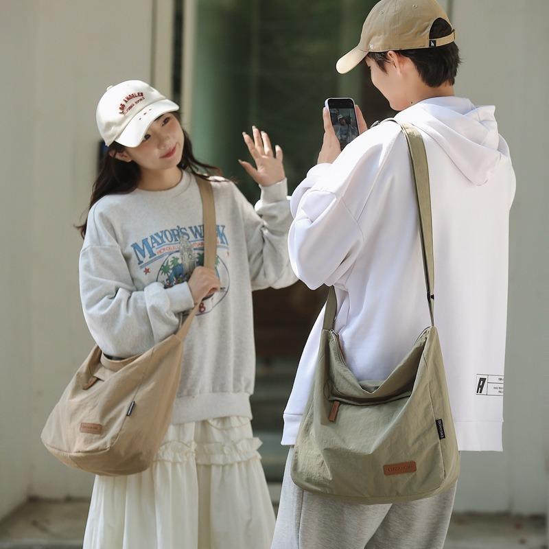 Women's bag Large capacity canvas bag Premium portable messenger simple tote bag Fashion versatile shoulder messenger bag