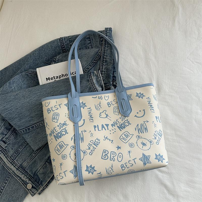 Einfache Temperament große Kapazität Tragetasche Damen 2025 Sommer neu kleine frische Druck Schulter Computertasche