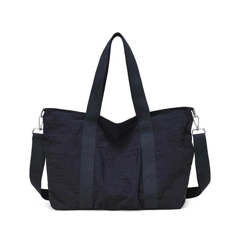 

Женская универсальная сумка-тоут и кроссбоди большой вместимости однотонная чёрный