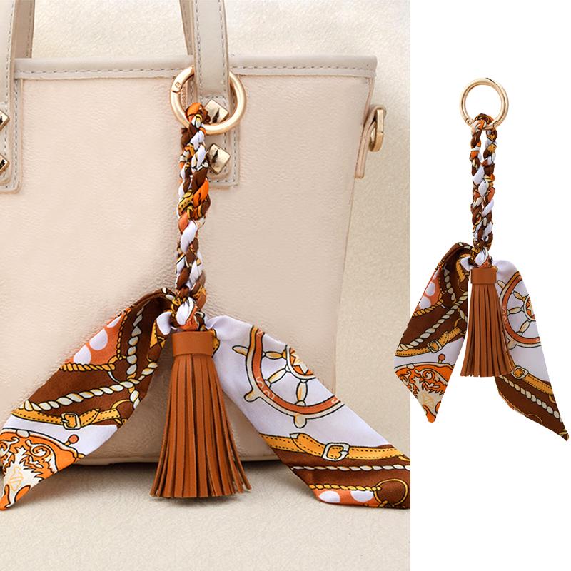 Femme Alliage Tissé à la Main Polyester Pendentifs Sac Cadeau Créatif Porte-clés Supports Ornement Ruban de Soie Porte-clés Personnalité 9 Couleurs