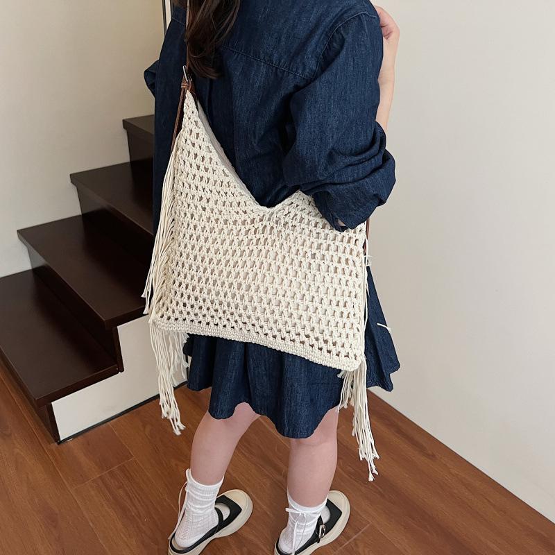 Vintage tassel hollow braided underarm bag women's summer versatile hand-woven vacation shoulder tote bag