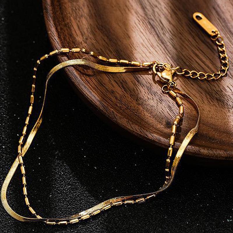 

Минималистичный двухслойный браслет на ногу в виде змеиной кости для женщин - Универсальный и стильный дизайн